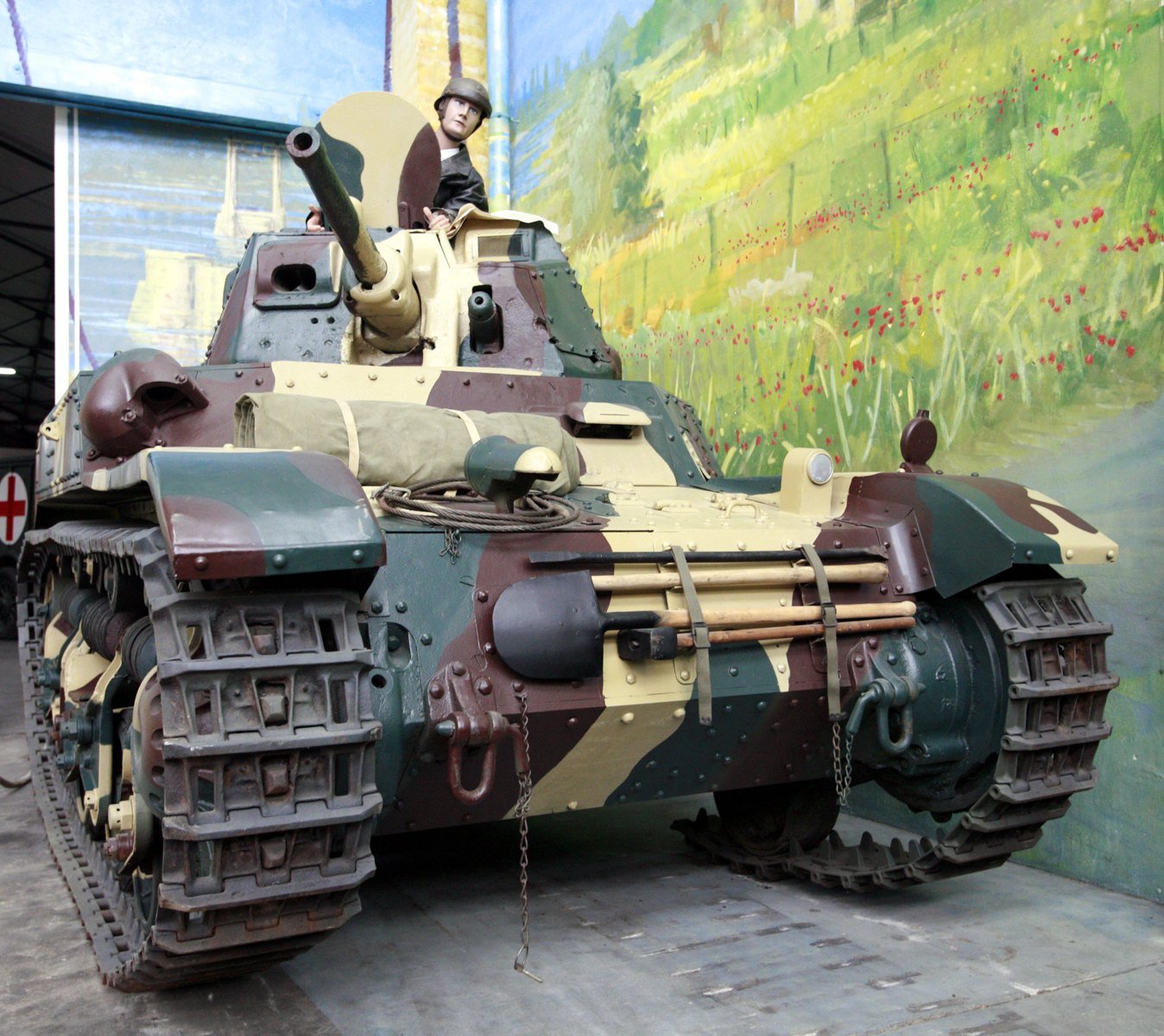 AMC 35 at Saumur, frontal/turret detail Shows studying mantlet, glacis, and preserved turret fittings. photograph taken 18 July 2009 per Exif/source page. Saumur General Estienne / Musee des Blindes. Source/. restored museum vehicle; attribution required.