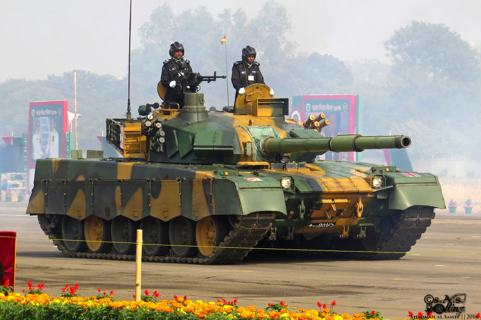 Bangladesh Army MBT-2000 in VGTJ/VDP 2016 public display. Vehicle / variant identification: Bangladesh Army MBT-2000. 15 December 2016. Tejgaon Airport / Bangladesh parade context per Commons categories. image Shows turret/hull silhouette and external fittings; does not prove internal configuration.