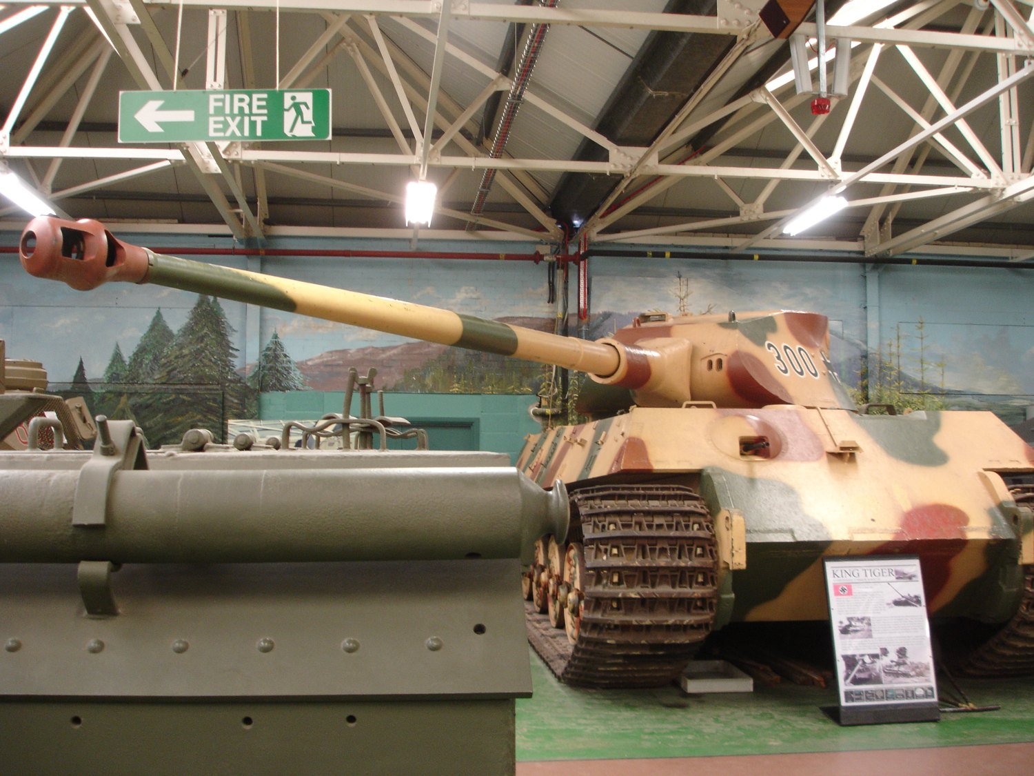 Tiger II 104 at The Tank Museum, Bovington, front-left view, photographed 14 March 2017. museum vehicle; external paint/restoration state is not direct evidence for every 1944 detail.