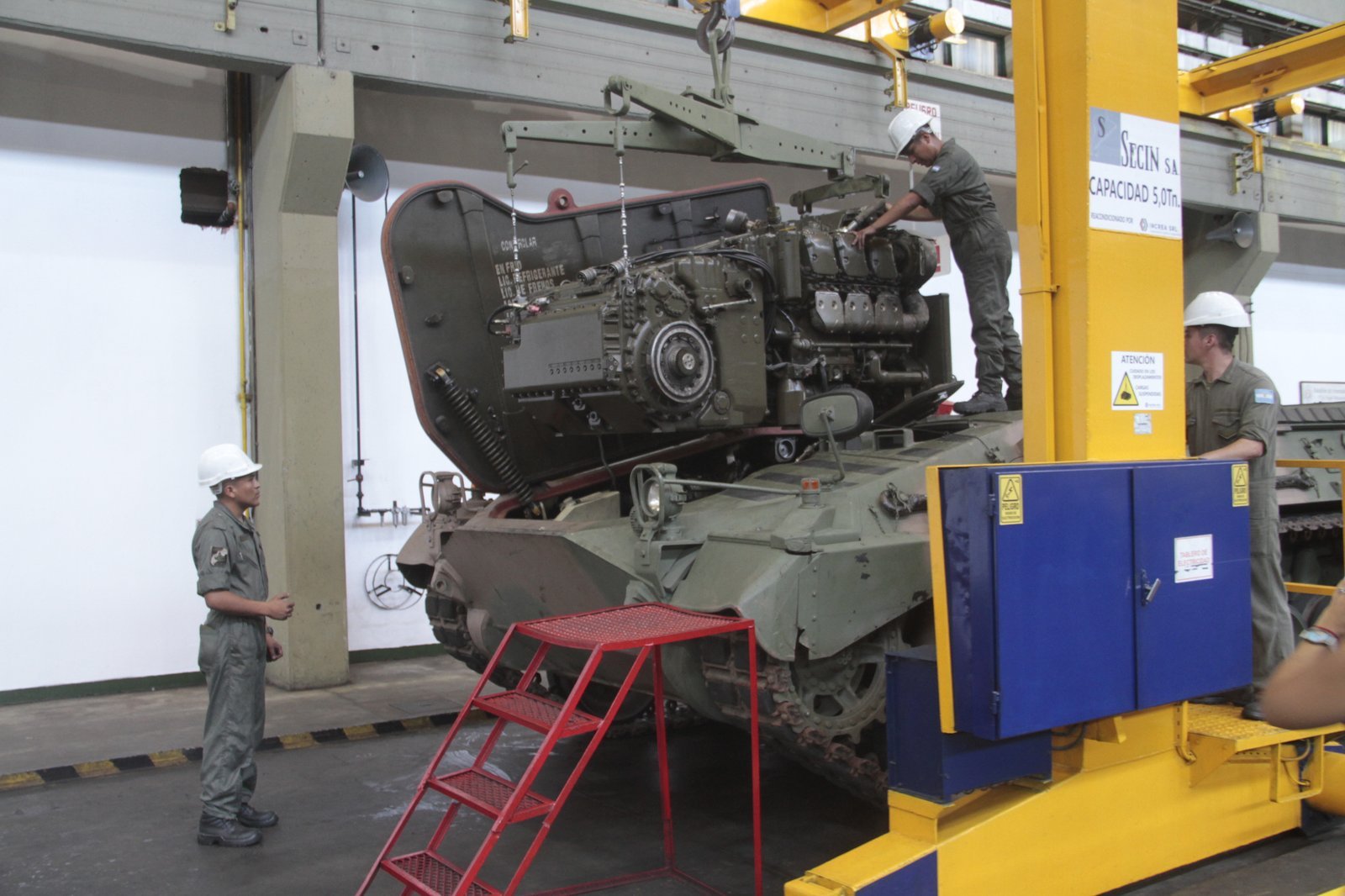 Powerpack or engine-bay work during TAM 2C modernization. January 2020 article context. Boulogne. maintenance / sustainment image, not a combat or field view.