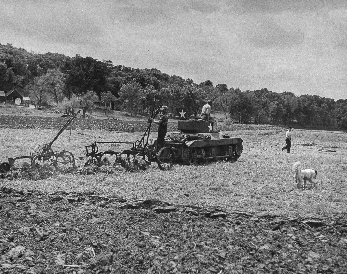 Postwar demilitarized M22/T9-series vehicle used as a farm tractor, United States, post-1946 context. not specified in image metadata reviewed here, tied to Rock Island Arsenal public-history article on farm tractor sales. Source /. postwar utility conversion, not a combat configuration. [S7].