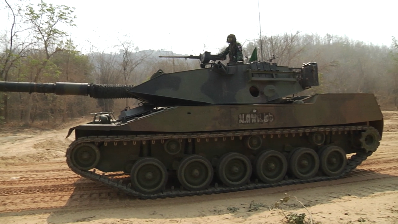 Royal Thai Army Stingray light tank in live-fire training at Cobra Gold 2019, Sukhothai, Thailand, 21 February 2019. side view emphasizing low turret profile and suspension.