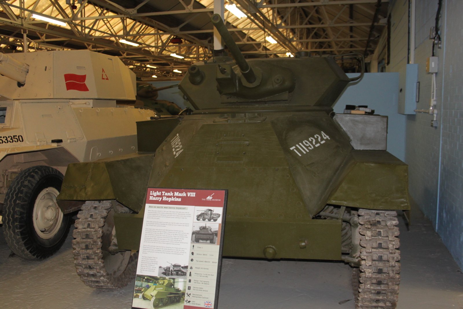 Front view of the preserved Light Tank Mk VIII Harry Hopkins at The Tank Museum, Bovington, showing the sloped frontal armor and compact turret. Vehicle / variant identification: Light Tank Mk VIII Harry Hopkins survivor at The Tank Museum; registration T119224 visible in museum context. Date /. 15 October 2014, The Tank Museum, Bovington, United Kingdom. Source /. Museum display/restoration condition; not a wartime service photograph. Good for preserved survivor and frontal hull/turret form.