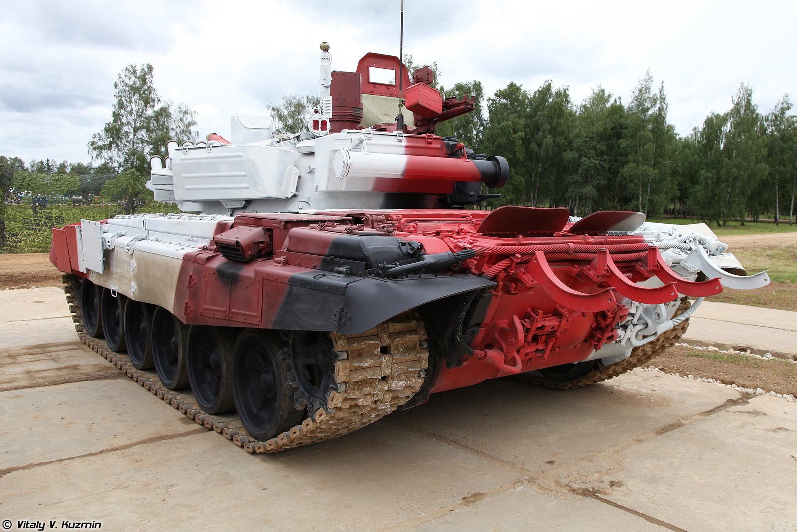 T-72B3 mod. 2014 in Tank Biathlon livery, rear/side view. 28 June 2014, 11:20:18. Russia / Tank Biathlon setting. rear view shows hull, stowage and competition-specific features; watermark present in source file.