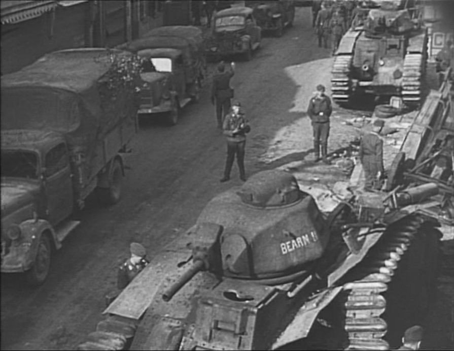 Abandoned B1 bis tanks at Beaumont in May 1940, reproduced as a still from a later U.S. War Department film; event date and film-release date are distinct.